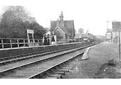 A late 19th century view of Birdingbury station showing LNWR slotted semaphore signals on the right adjacent to the goods yard