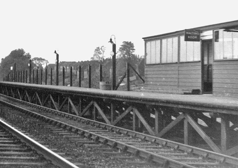 Close up showing the down platform with a slightly larger waiting room but no platform furniture