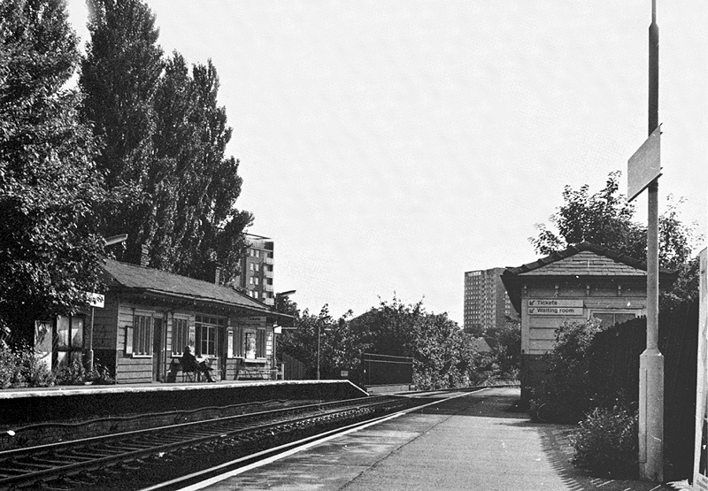 Looking in the direction of Birmingham with the bridge carry the railway over Chester Road seen beyond the platform