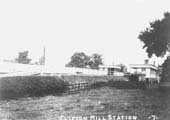 An Edwardian postcard showing the rear of Clifton Mill station's up platform seen from an adjacent field