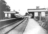 Looking along the up platform towards Market Harborough with the main station building on the right