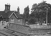 Looking towards Birmingham this late Victorian view of the station master's house shows the level crossing closed to road traffic