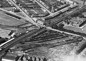 A 1931 aerial photograph of Coundon Road station, the level crossing and its very busy Coal Wharf