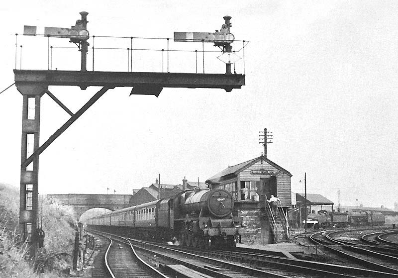 Ex-LMS 4-6-0 5XP Jubilee class No 45647 'Sturdee' is seen coasting in to Coventry station on an Euston to Birmingham express