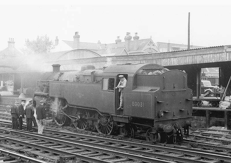  BR Standard 4MT 2-6-4T No 80081 is seen derailed and fouling the mainline inside the sidings of the old parcel depot