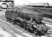 Ex-LMS 8F 2-8-0 No 48504 restarts from Coventry No 3 Signal cabin as it runs light engine through the station