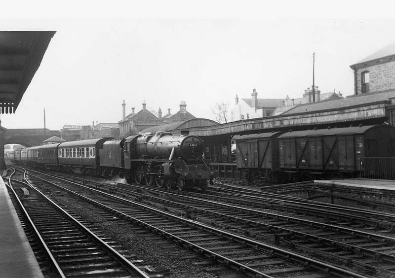 Ex-LMS 4-6-0 'Black 5' No 44863 enters Coventry station's up platform at the head of an express service in 1956