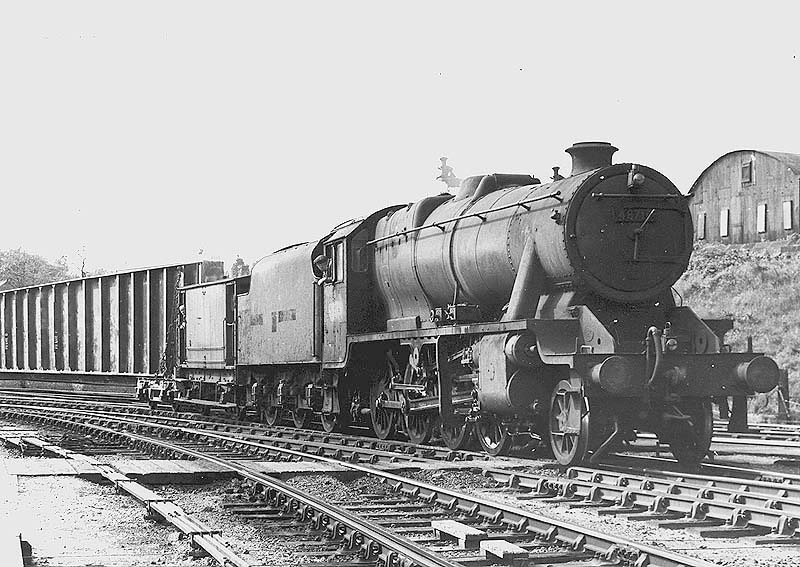 Ex-LMS 2-8-0 8F No 48716 is seen at the head of a special load - a large girder for a railway bridge - as it enters the Leamington branch