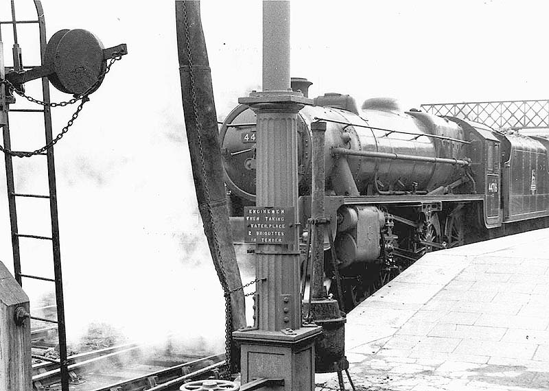 British Railways built 5MT 4-6-0 No 44716 stands at Platform 2 at the head of a down express service