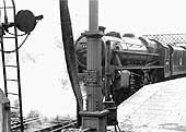 BR built 5MT 4-6-0 No 44716 stands at Platform 2 at the head of a down express service to New Street station