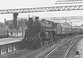 BR Standard 4-6-0 5MT No 73115 'King Pellinore' is seen entering Coventry station's new platform three as it comes off the Leamington branch