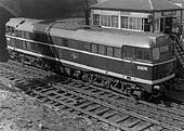 British Railways Type 2 Brush D5574 is seen on parcels duty and is running wrong line past Coventry No 2 Signal box