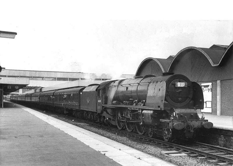 Ex-LMS 4-6-2 8P Coronation class No 46240 'City of Coventry stands at Coventry station's new platform one with an up Birmingham to Euston express