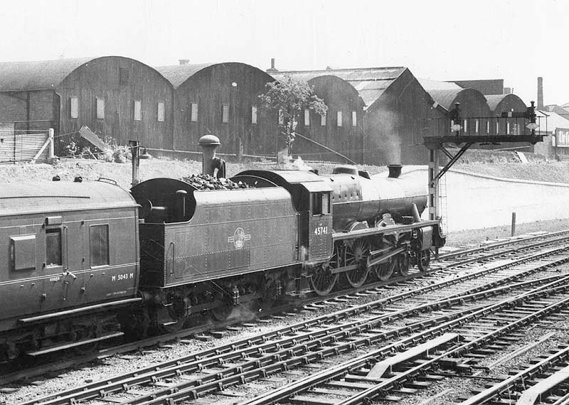 Ex-LMS 4-6-0 Jubilee class No 45741 'Leinster' leaves platform one with an up express train in the 1950s