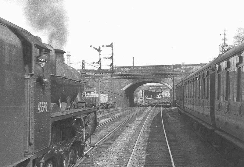 Ex-LMS 6P 4-6-0 Jubilee class No 45592 'Indore' with an up express approaching Warwick Road bridge in 1956 with the station beyond