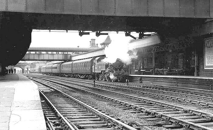 British Railways built 2MT 2-6-2T No 41226 arrives at Platform 1 on a five-coach up local Nuneaton to Leamington passenger service