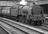 A grimy ex-LMS 4-6-0 unnamed Patriot class No 45517 is seen passing at speed through Coventry with an up express service