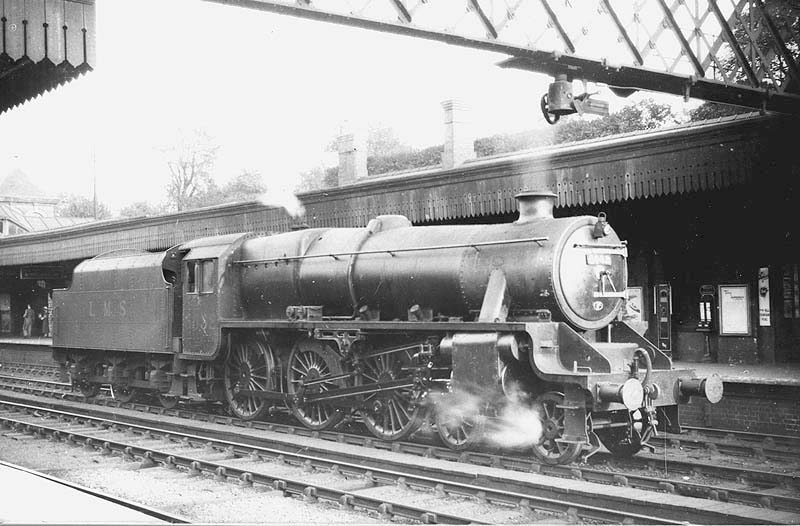 LMS 5MT 4-6-0 No 5052 stands light engine on the down through road at Coventry station circa 1935