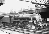LMS 5MT 4-6-0 No 5052 stands light engine on the down through road at Coventry station circa 1935