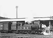 Ex-LNWR 2-4-2T No 6723 is seen with safety valves lifting as it pauses between shunting duties in the parcels bay