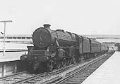 Ex-LMS 4-6-0 5MT No 45198 is seen standing at Coventry station's new platform three on a down Euston to Birmingham express