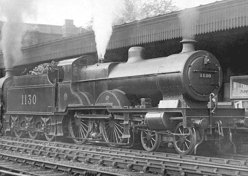 LMS 4-4-0 4P Compound No 1130 pilots classmate No 1129 on a down Euston to Birmingham semi-fast express service