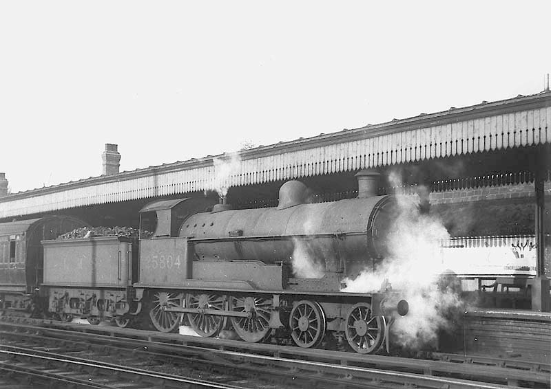 Unnamed ex-LNWR 4-6-0 Prince of Wales class No 25804 is seen arriving at platform one on an up local passenger service in the late 1930s