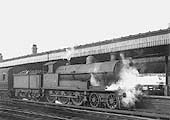 Ex-LNWR 4-6-0 No 25804 is seen arriving at platform one on an up local passenger service in the late 1930s