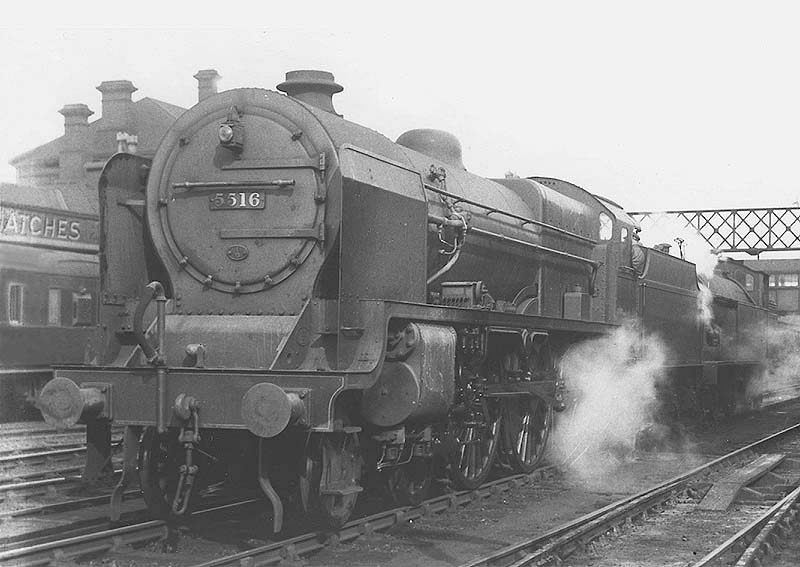 LMS 4-6-0 5XP Patriot class No 5516 'The Bedfordshire and Hertfordshire Regiment' is seen coupled to an  ex-LNWR tank locomotiove
