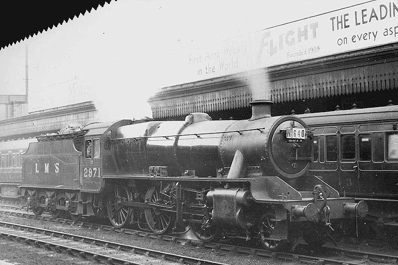 LMS 2-6-0 'Stanier Mogul' No 2971 is seen standing on the down through road ready to take forward an north bound excursion