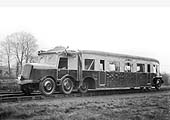 A three-quarters frontal view of the Michelin Type 9 Rail Car between tests standing in in Coventry