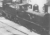 Close up view showing LNWR Class 7'-0 2-2-2 'Bloomer' No 251 'Apollo' standing at Coventry station taking on water