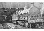 Ex-LNWR G2 Class 0-8-0 No 49431 stands in steam outside the new Coventry shed on 2nd March 1958