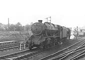 View of ex-LMS 2-8-0 8F No 48723 is seen in tandem with an unidentified member of the same class coming off shed after being coaled