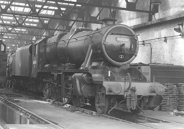 A clean ex-LMS 2-8-0 8F No 48526 carrying a 2A Rugby shed plate is seen reposed inside of Coventry's new shed