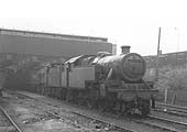 A view of a line of condemned ex-LMS locomotives including a 4MT 2-6-4T, two 2P 4-4-0 standing in Coventry station's now closed engine shed