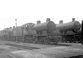 View of three ex-LMS 4-4-0 2Ps including Nos 40694, 40699 in store outside of Coventry's new shed on 26th April 1960