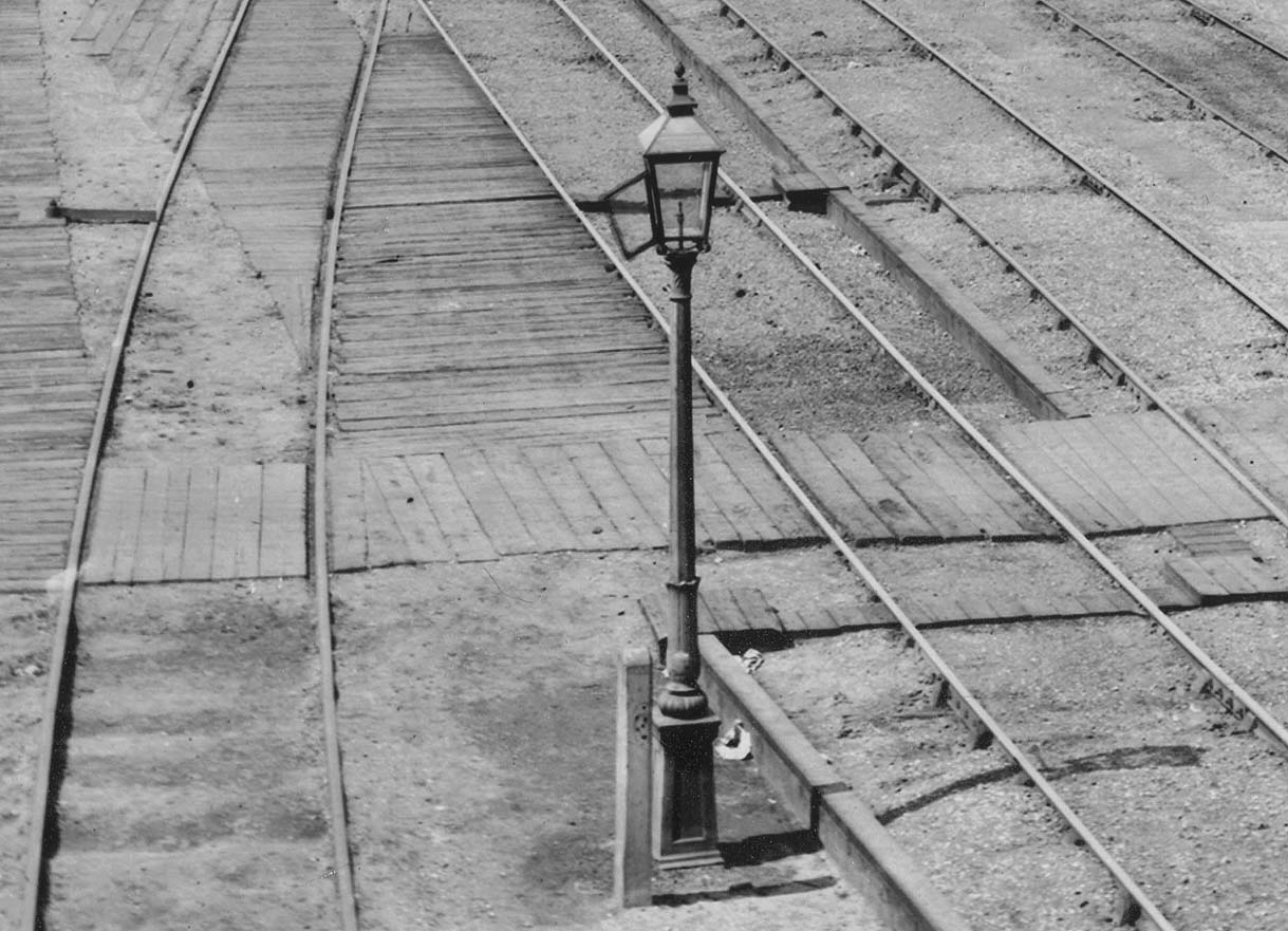 Close up showing the gas lamppost and the ducting used to protect the rodding to the signal and points