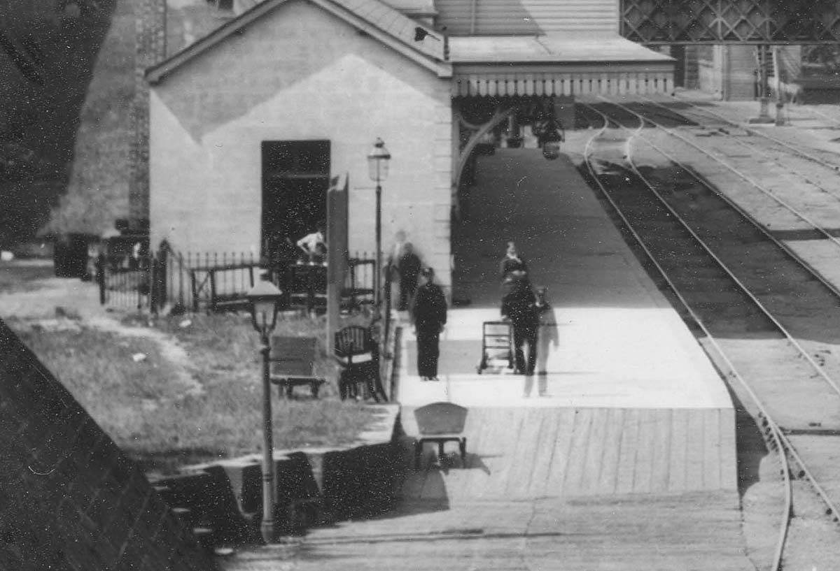 Close up showing the new waiting room and just how short the down platform was for much of the 19th century