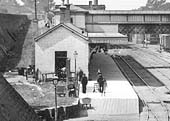 Close up showing the new waiting room and just how short the down platform was for much of the 19th century