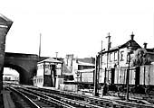 View of Coventry No 2 signal cabin with the parcels depot on the right and 15mph sign and the water column
