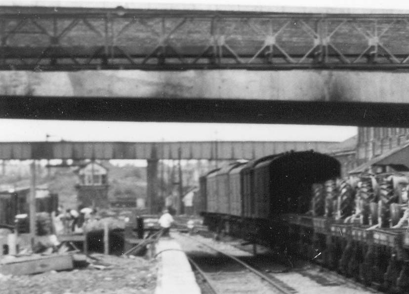 Close up showing the end of Coventry's island platform looking towards Birmingham as a Permanent Way gang realign the tracks