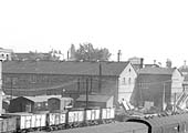 Close up showing Warwick Goods yard offices and the miscellaneous huts used for storage and mess facilities
