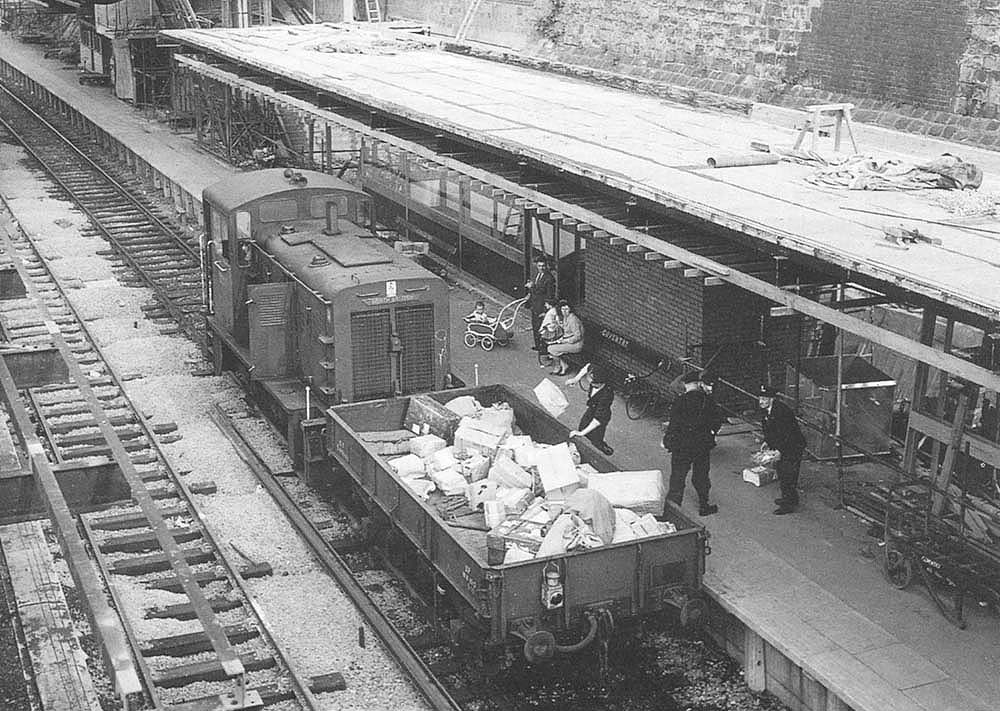 British Railways Diesel Hydraulic 0-4-0 D 2911 is seen about to shunt a wagon of parcels from Platform 4 to Platform 1 on 13th June 1961