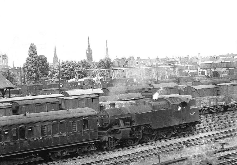 Ex-LMS 4MT 2-6-4T	No 42265	is seen marshalling empty coaching stock in Coventry goods yard in the early 1960s