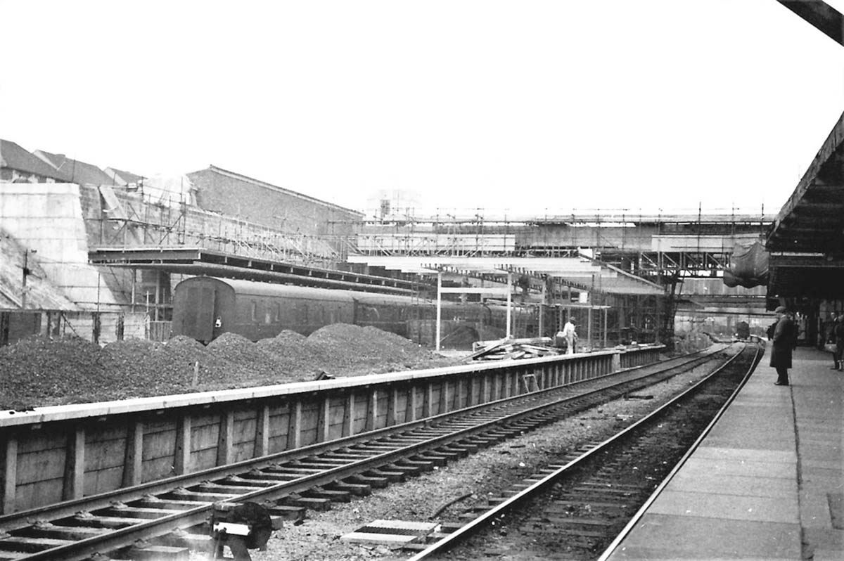 A view looking towards New Street along Platform 1 showing Platforms 2 and 3 significantly built to erect the steel structure for their waiting rooms