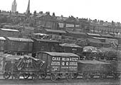 Close up of the wagons in the yard including a GW and a GE wagon behind the Chas Nelson & Co Ltd Van