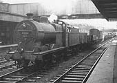 Ex-LMS 0-6-0 4F No 44152 heads a down Class H freight on to the through road past Coventry No Signal Cabin circa 1951