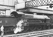 LMS rebuild 4-6-0 Claughton Class No 6004 is seen manouvring a vehicle on to the rear of a Rugby-bound train on 8th August 1937