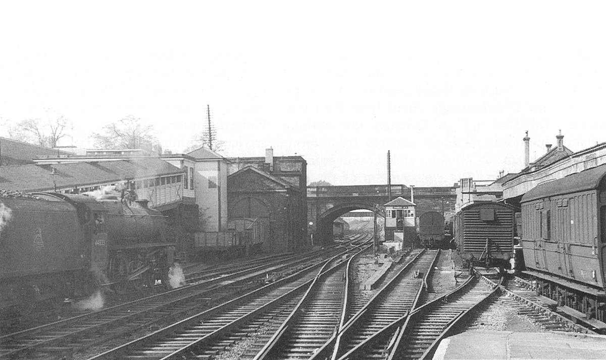 Ex-LMS 4-6-0 5MT No 44833 awaits to depart Coventry with a service bound for New Street on 5th October 1957